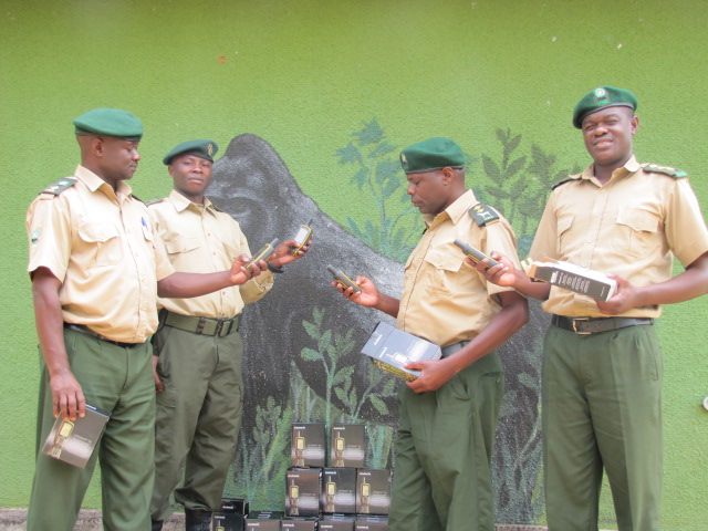 Senior staff checking GPS units and ranger field force distributing units to patrol outposts and gorilla monitoring points.